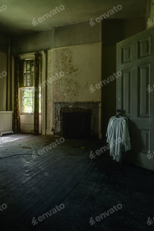 Preview: An Interior View Of A Derelict Room With A White Gown Hanging On A Door In An Abandoned Boys School