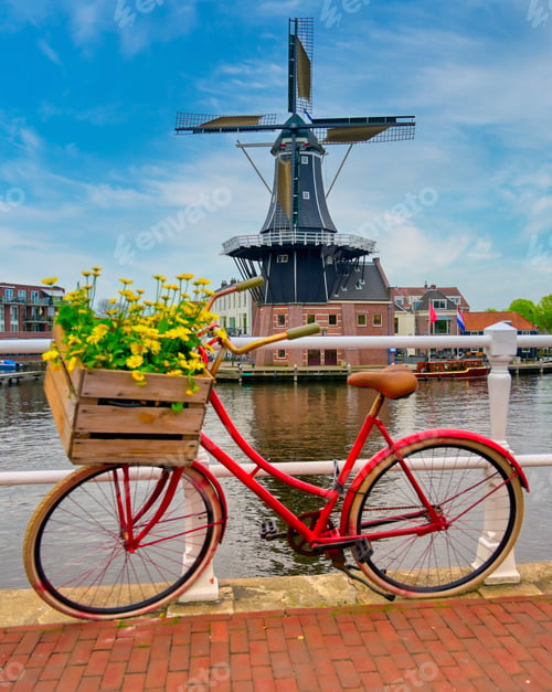 Preview: A Windmill Along The Canals In Haarlem, Netherlands On A Clear Day.