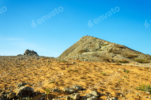 Preview: Pilon De Azucar Hill Rising Above A Dry Barren Desert In La Guajira, Colombia