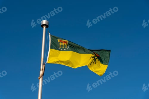 Preview: Saskatchewan Flag Against Blue Sky.