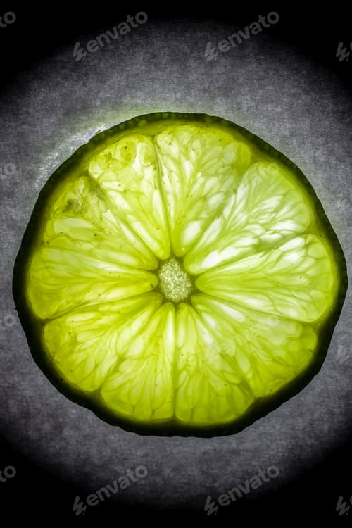 Preview: Cross Section Slice Of Lime Against Textured Background