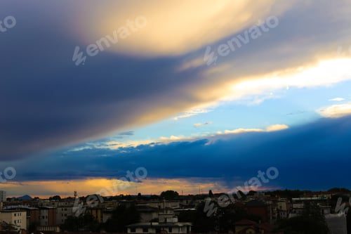 Preview: Wonderful Cityscape In Sunset Backgound. Concept Of Dusk And Summer Cloudscape In City.