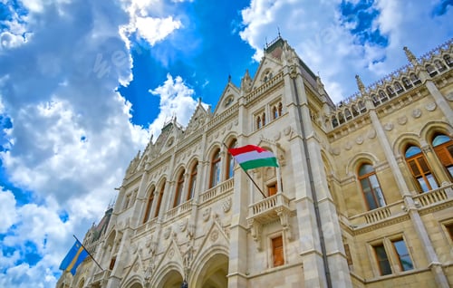 Preview: The Hungarian Parliament Building Located On The Danube River In Budapest Hungary At Sunset.