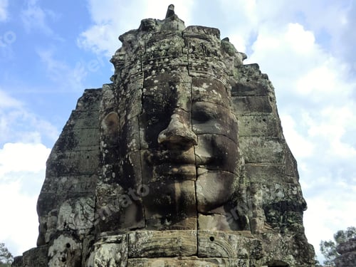 Preview: Bayon Temple With Carved Stone Faces In Siem Reap Cambodia Jungle