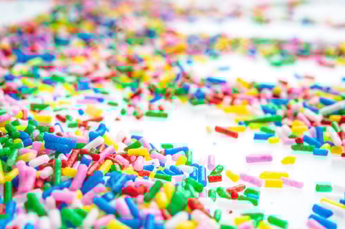 Preview: Colorful Candy Sprinkles Close Up For Birthday Cake On White Background