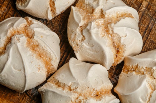 Preview: Traditional Latin American Dessert Called Suspiro Or Meringue. On Wooden Table