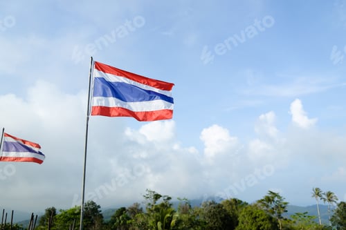 Preview: Thailand Striped Flag On Sky Background. Concept Of Patriotism And Symbols.