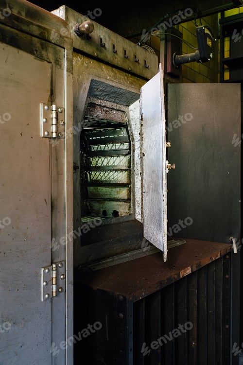 Preview: An Open Door To A Steel Dryer Inside An Abandoned Glass Manufacturing Company, Since Demolished.
