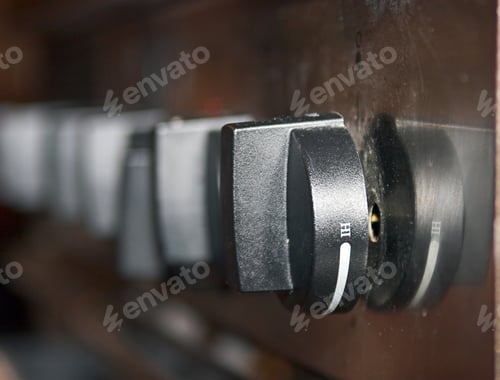 Preview: Color Dslr Picture Of Black Control Knobs From A High-End Residential Gas Cooking Range. Abstract