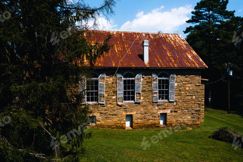 Preview: This Is An Exterior View Of Derelict Wood Shutters And Windows Against Sandstone At The Abandoned