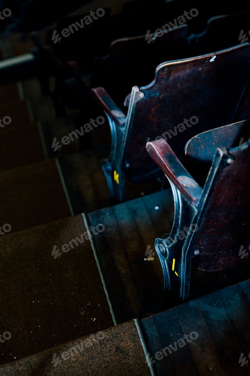 Preview: A Detail View Of Wood And Cast Iron Seats At An Abandoned And Historic Theater In The South Side