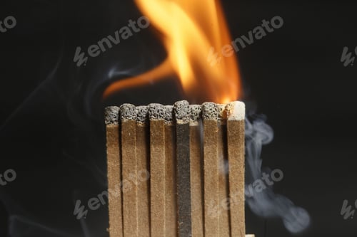 Preview: Sequence Of Burning Match On Black Background