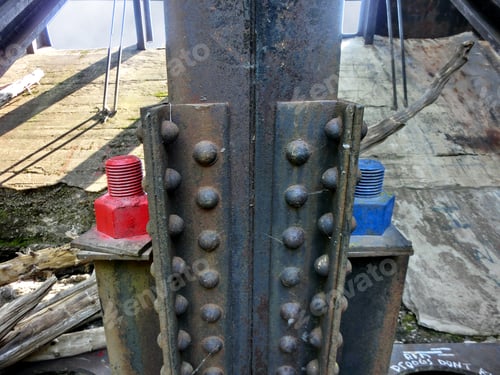 Preview: Industrial Metal Girder With Red And Blue Bolts - Landscape Photo
