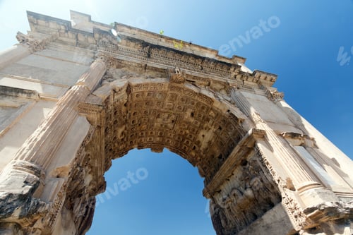 Preview: Looking Up At The Arch Of Constantine, Rome, Italy, With A Bright Blue Sky Background