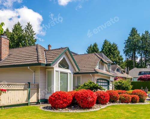 Preview: Luxury House With Beautiful Landscaping On A Sunny Day. Home Exterior.