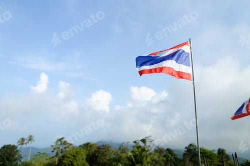 Preview: Thailand Flag On Sky Background. Concept Of Patriotism And Symbols.