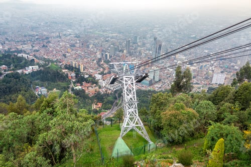 Preview: Aerial Tramway Leading Up To Monserrate Mountain With Bogota, Colombia In The Background