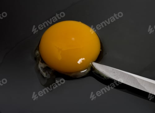 Preview: Egg Yolk And Sharp Knife