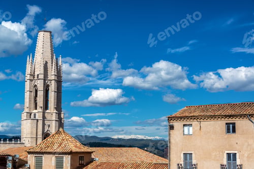 Preview: Tower Of The Church Of St. Felix With The Pyrenees Mountains In The Background In Girona, Spain