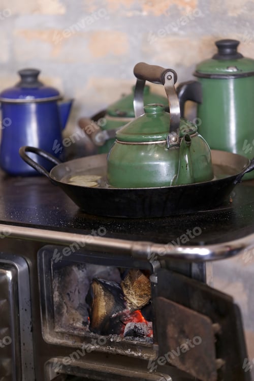 Warm Fire Heating A Coffee Kettle In Wood Burning Stove. Traditional Style In Countryside Of Brazil