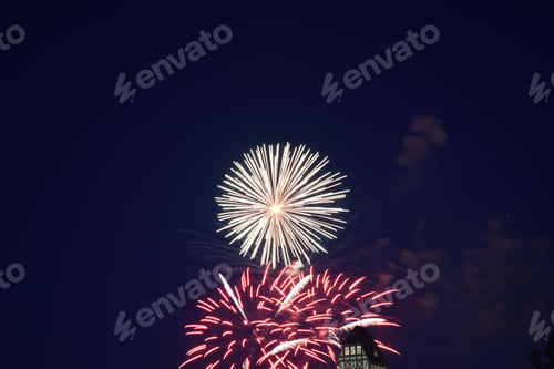 Preview: Fireworks On July Summer Night Celebrating National Holiday