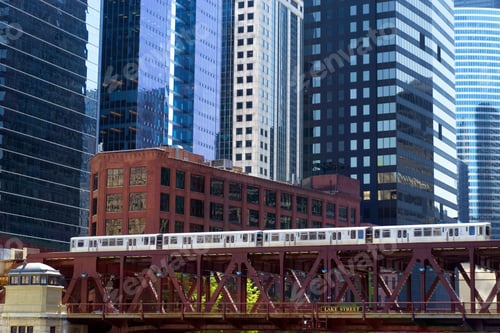 Preview: Elevated Train Passing By Skyscrapers In Downtown Chicago