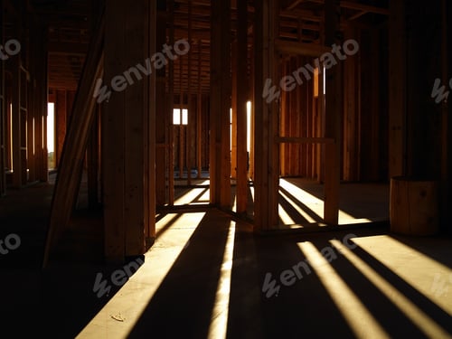 Preview: The Late Day Sun Shining Through The Wooden Framework Of An Arizona House Under Construction.