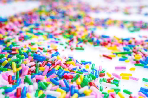 Preview: Colorful Candy Sprinkles Close Up For Birthday Cake On White Background