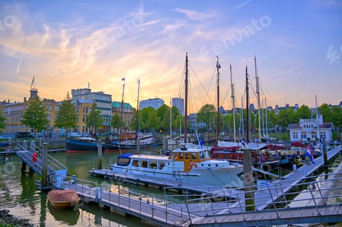 Preview: Ships Docked Along The Canals In Rotterdam, Netherlands At Sunset.