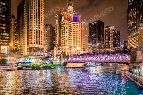 Preview: Beautiful Downtown Chicago At Night With Lit Buildings, River And Bridge.