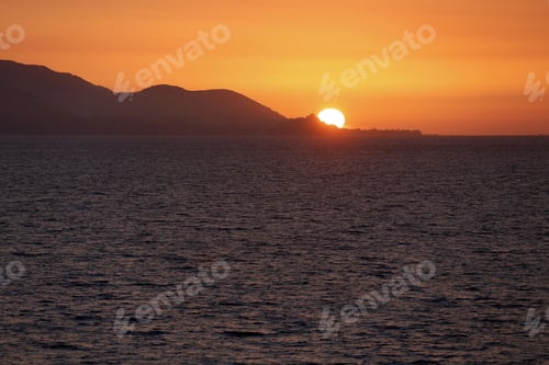 Preview: View Of Golden Sunset Over Water