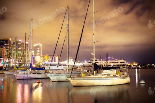 Preview: Beautiful Night View Of San Diego California With Boats, Lit Buildings And Water