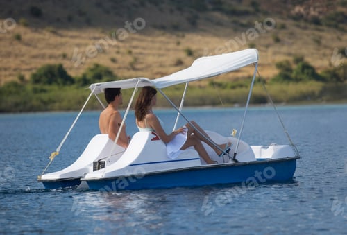 Preview: A Couple Having Fun In A Pedalo