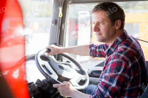 Preview: Truck Driver Driving In Cab Of Semi-Truck