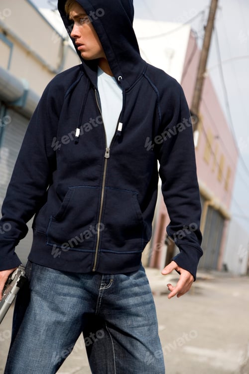 Preview: Portrait Of A Young Man Holding A Gun