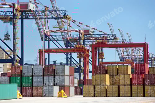 Preview: Wide Shot Of A Commercial Harbor With Cranes And Cargo Containers.