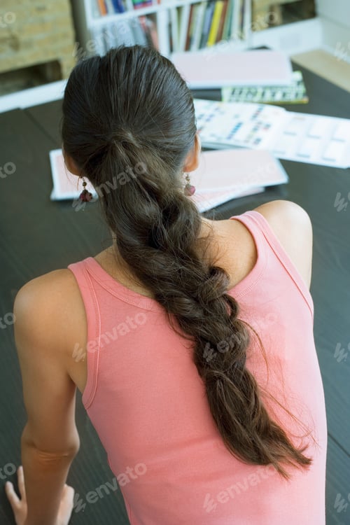 Preview: Woman with Braided Hair from the Back