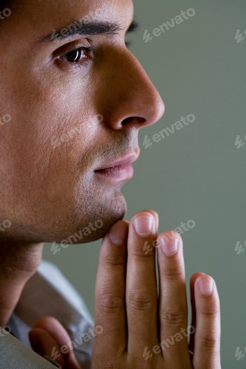 Preview: Portrait Of A Man With His Hands In A Praying Position