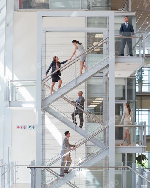 Preview: Business Employees Ascending Stairs In An Office Conveying Growth Concept