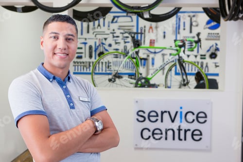 Preview: Portrait Of Male Sales Assistant In Cycle Repair Store