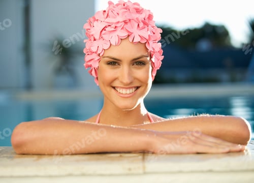 Preview: A Woman In A Swimming Hat In A Pool