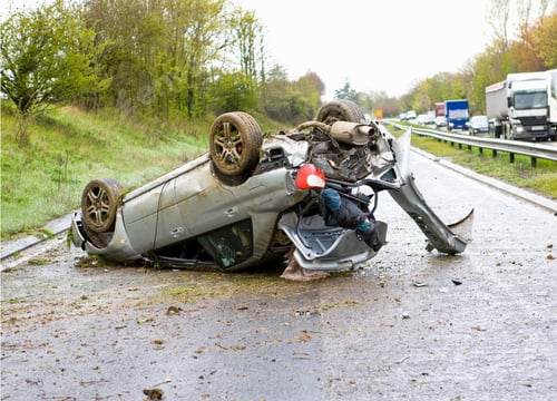Preview: Car After A Crash Lying Upside Down On A Motorway.