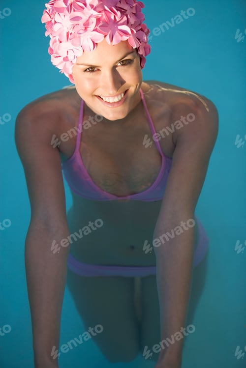 Preview: A Woman In A Bikini And Swimming Hat