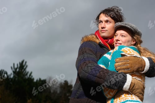 Preview: A Couple Embracing On A Cold Winters Day