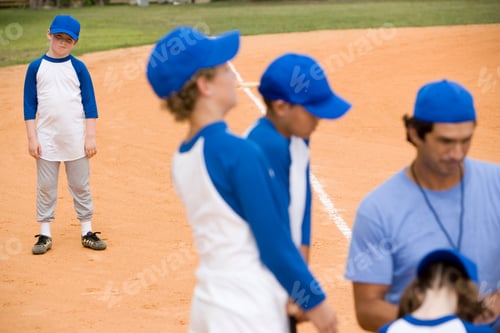 Preview: Baseball Team And Coach On Pitch
