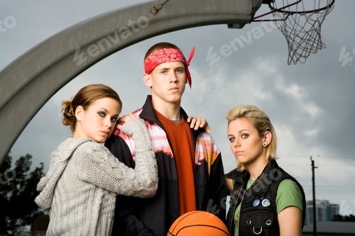 Preview: Three Teenage Friends Hanging Out On A Basketball Court