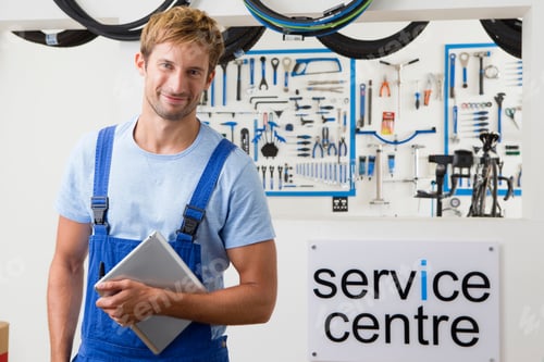Preview: A Horizontal Mid Length Shot With Selective Focus On Young Technician At Cycle Service Centre.