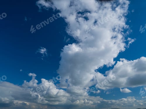 Preview: White Clouds Against Blue Summer Sky