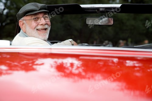 Preview: A Senior Man Driving A Sports Car
