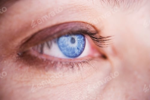 Preview: A Woman'S Blue Eye With Makeup